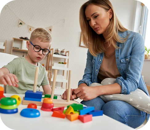 female therapist with child patient