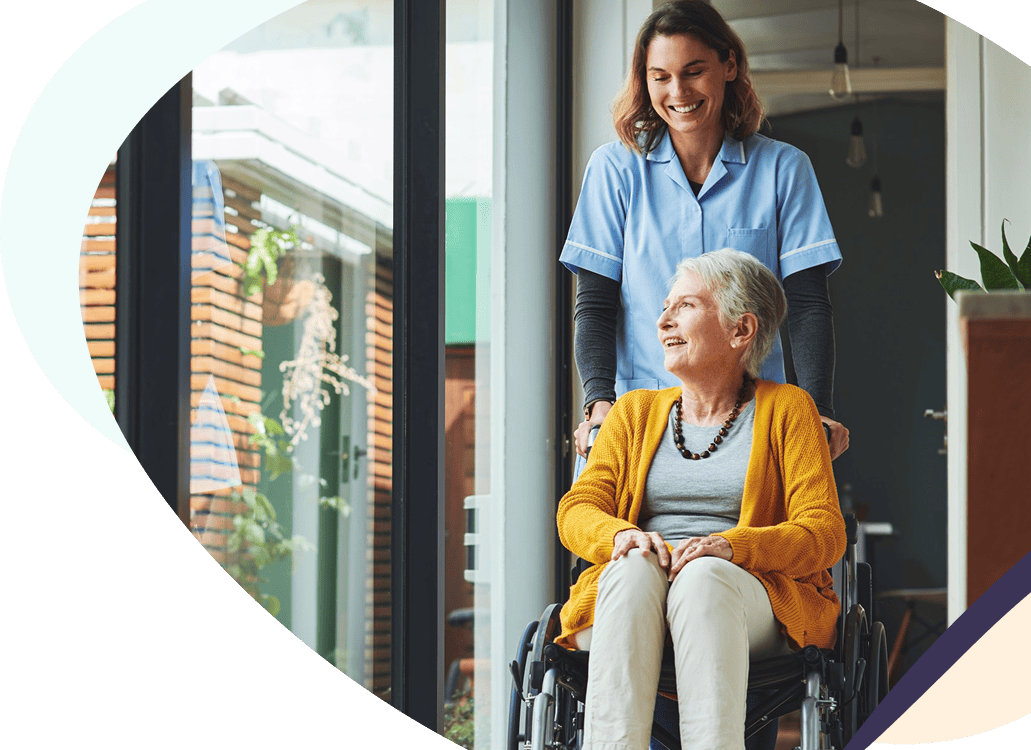 nurse taking elder women on wheelchair