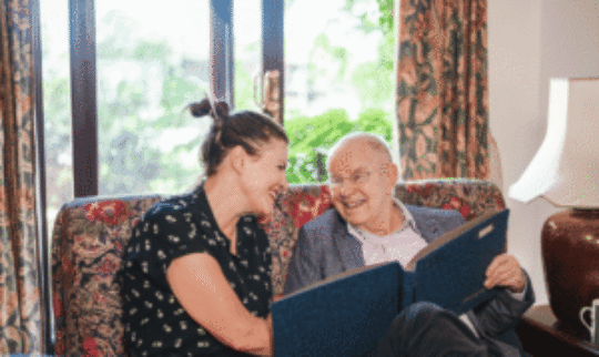 Adult child with aged care parent