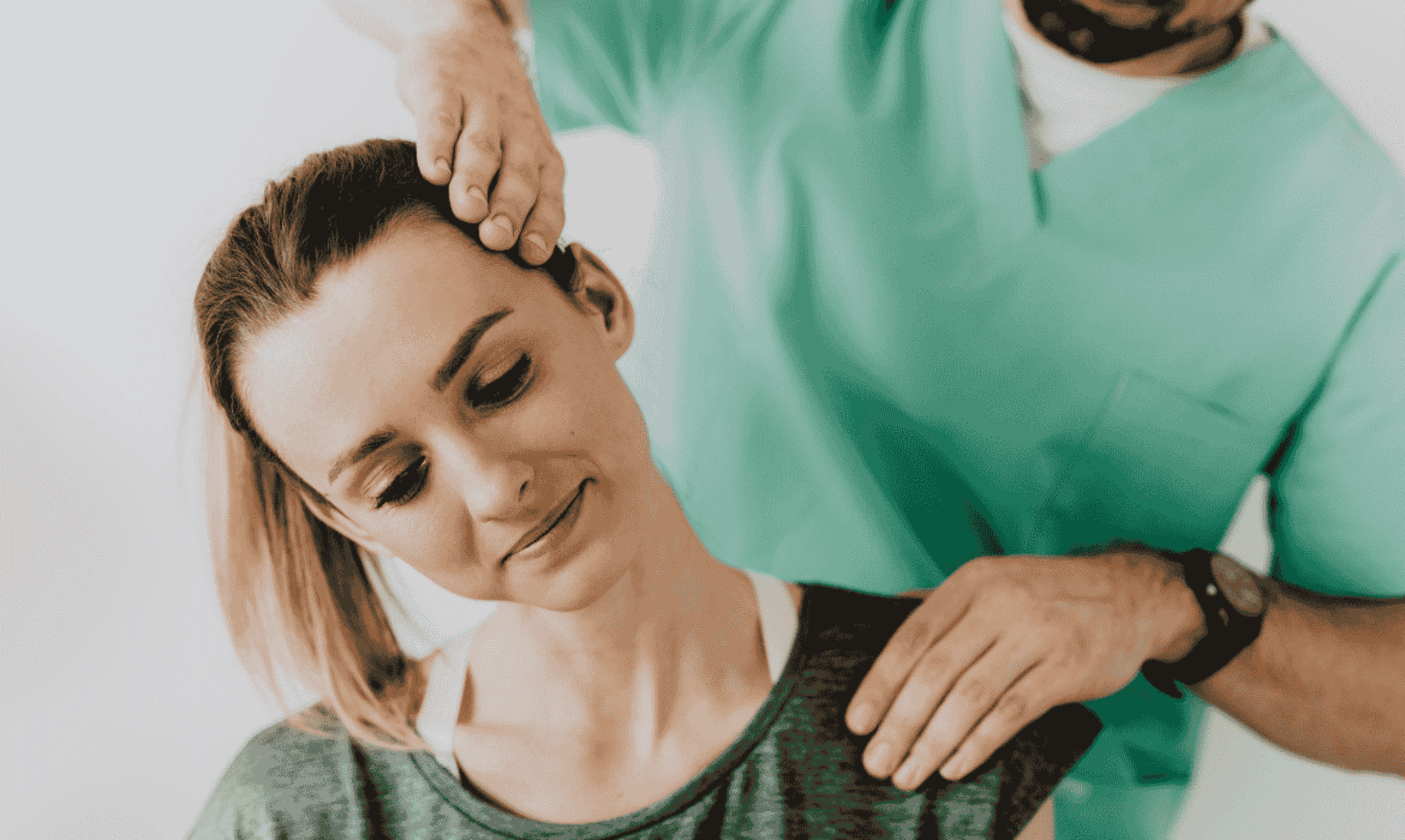 allied health professional treating a patient
