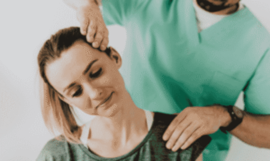 allied health professional treating a patient